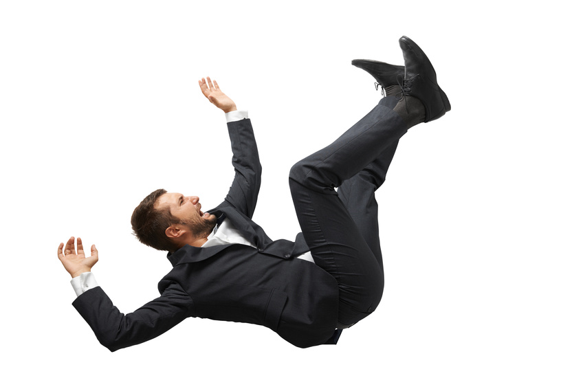 falling and screaming businessman in formal wear over white background