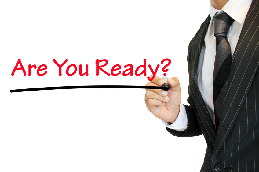 “Are you ready?” 準備万端か尋ねるビジネスマン a question written by a young businessman